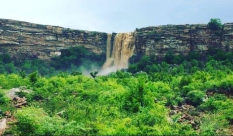 The natural beauty of an 800-year-old historical Mohna village with a waterfall falling from the mountain in the rainy season. The famous Shiva temple 'Devaria Mahadev' is also seen in the mountains near the waterfall.