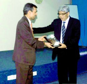 Padma Shri Prof. Amod Gupta Presenting a Memento to Dr Suresh K. Pandey during the PGIMER, Chandigarh AEC Foundation Day (March 18, 2013)
